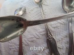 4 antique solid silver salt spoons by jeweler L & R and 2 crossed oars