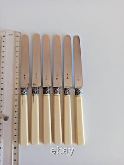 6 antique dessert knives, 19th century, solid silver, chiseled flowers, R/2