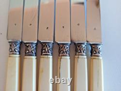 6 antique dessert knives, 19th century, solid silver, chiseled flowers, R/2