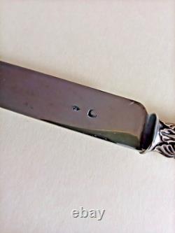 6 antique dessert knives, 19th century, solid silver, chiseled flowers, R/2
