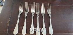 6 solid silver antique forks weighing 475 grams with goldsmith's hallmark.