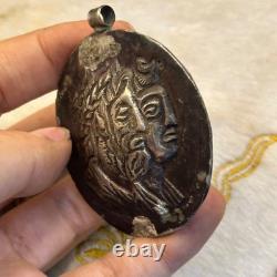 Ancient Roman silver pendant amulet with two faces of kings