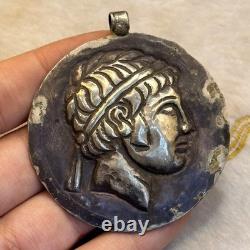 Ancient Roman solid silver king-face pendant amulet