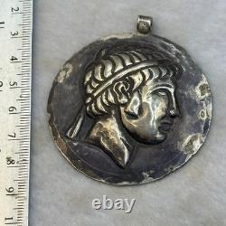 Ancient Roman solid silver king-face pendant amulet
