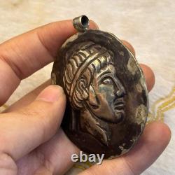 Ancient Roman solid silver king-face pendant amulet