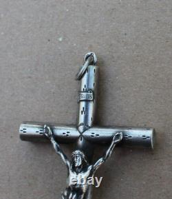 Ancient and large pendant crucifix cross in solid silver (religious object)