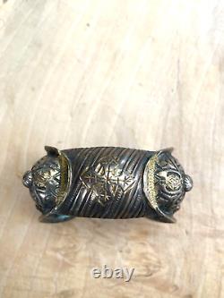 Ancient jewelry: solid silver bracelet with a cross from Eastern Russia