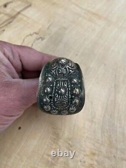 Ancient jewelry: solid silver bracelet with a cross from Eastern Russia