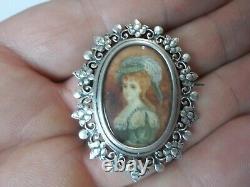 Ancient solid silver brooch, painting of a young woman