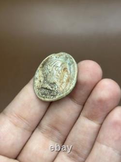 Ancient solid silver tetradrachm coin of the Greco-Bactrian king