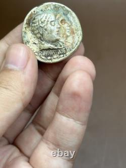 Ancient solid silver tetradrachm coin of the Greco-Bactrian king