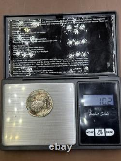 Ancient solid silver tetradrachm coin of the Greco-Bactrian king