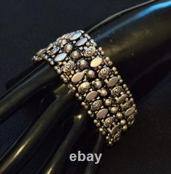 Antique Articulated Sterling Silver Cuff Bracelet with Sublime Floral Motifs