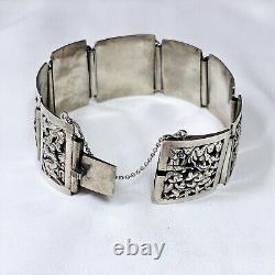 Antique Solid Silver Bracelet from Indochina Early 20th Century with Pagoda and Dragon Decorations