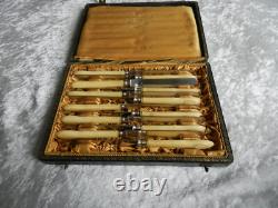 Antique box of 12 knives with solid silver blades Minerva