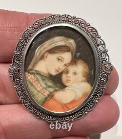 Antique brooch with miniature painting of Virgin and Child in Solid Silver