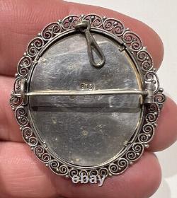 Antique brooch with miniature painting of Virgin and Child in Solid Silver