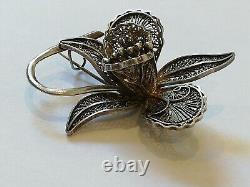 Antique filigree solid silver flower brooch