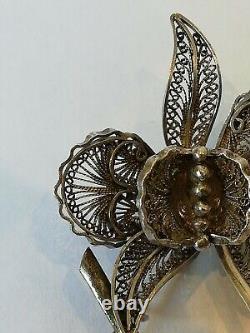 Antique filigree solid silver flower brooch