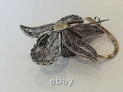 Antique filigree solid silver flower brooch