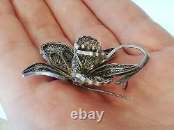 Antique filigree solid silver flower brooch