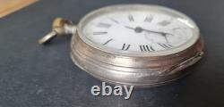 Antique large silver pocket watch with a chimera hallmark, in working condition