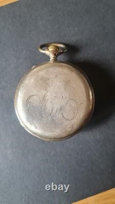 Antique large silver pocket watch with a chimera hallmark, in working condition
