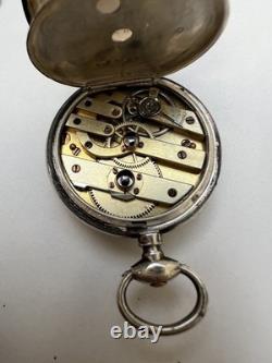 Antique silver pocket watch with key, enamel dial, Roman numerals
