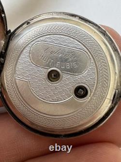 Antique silver pocket watch with key, enamel dial, Roman numerals
