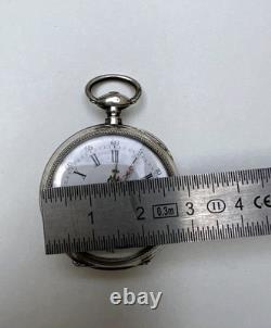 Antique silver pocket watch with key, enamel dial, Roman numerals