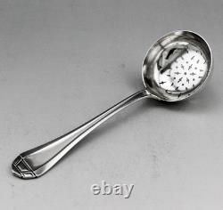 Antique silver sugar spoon or tea strainer, sterling silver, 1st standard hallmark