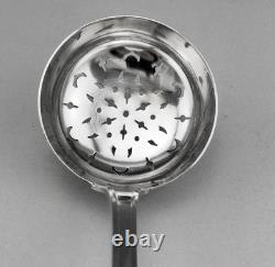 Antique silver sugar spoon or tea strainer, sterling silver, 1st standard hallmark