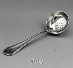 Antique silver sugar spoon or tea strainer, sterling silver, 1st standard hallmark