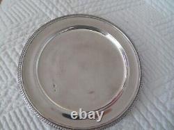 Antique small plate or bottle coaster in solid silver with horse head design