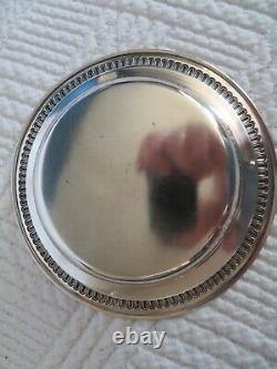 Antique small plate or bottle coaster in solid silver with horse head design