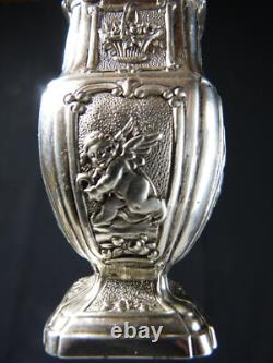 Antique solid silver baluster sugar shaker on pedestal with cherub decoration