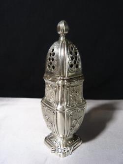 Antique solid silver baluster sugar shaker on pedestal with cherub decoration