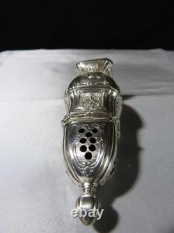 Antique solid silver baluster sugar shaker on pedestal with cherub decoration