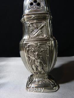 Antique solid silver baluster sugar shaker on pedestal with cherub decoration