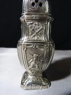 Antique solid silver baluster sugar shaker on pedestal with cherub decoration