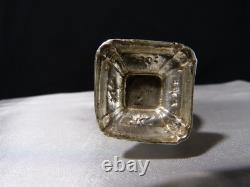 Antique solid silver baluster sugar shaker on pedestal with cherub decoration