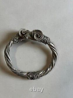 Antique solid silver bangle bracelet with 925 hallmark, ram heads, weight 42.63