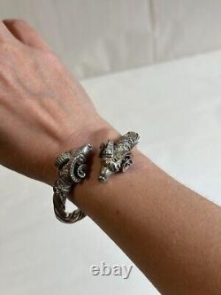 Antique solid silver bangle bracelet with 925 hallmark, ram heads, weight 42.63