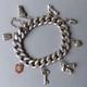 Antique Solid Silver Curb Bracelet With Heart, Monkey, And Iron-shaped Pendants