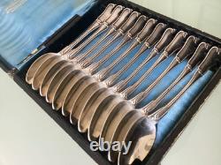 Antique solid silver cutlery set with Minerva hallmark