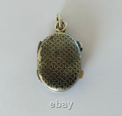 Antique solid silver reliquary pendant, relic of the True Cross, 19th century
