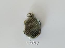 Antique solid silver reliquary pendant, relic of the True Cross, 19th century