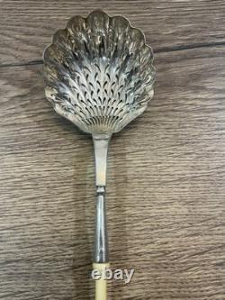 Antique solid silver sugar caster in old style