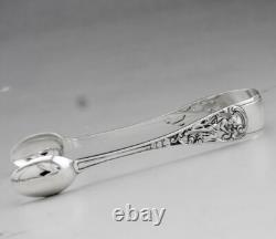 Antique solid silver sugar tongs with English London hallmarks 1894