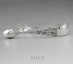 Antique solid silver sugar tongs with English London hallmarks 1894